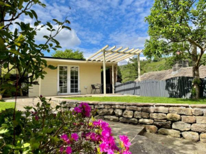 Apple tree hut, in a private garden